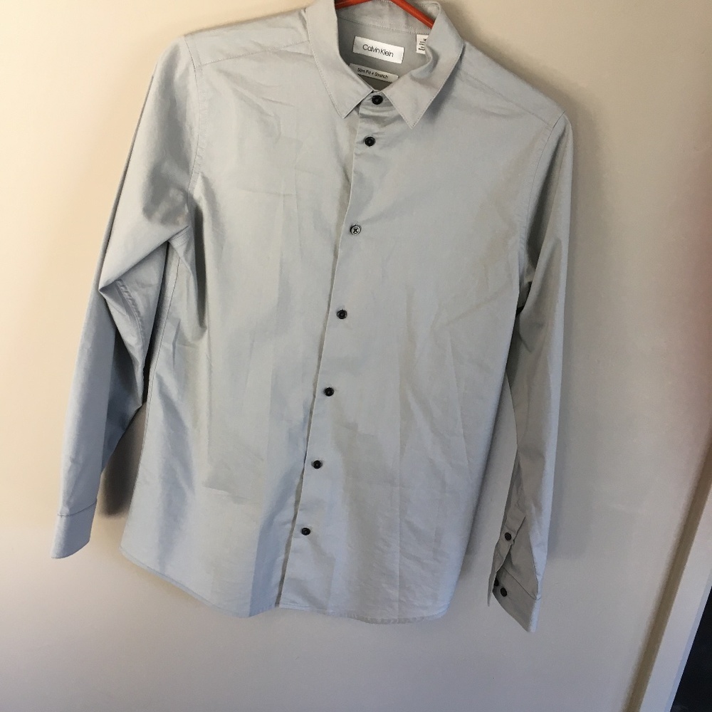 light gray boy's dress shirt by Calvin Klein, size 18
